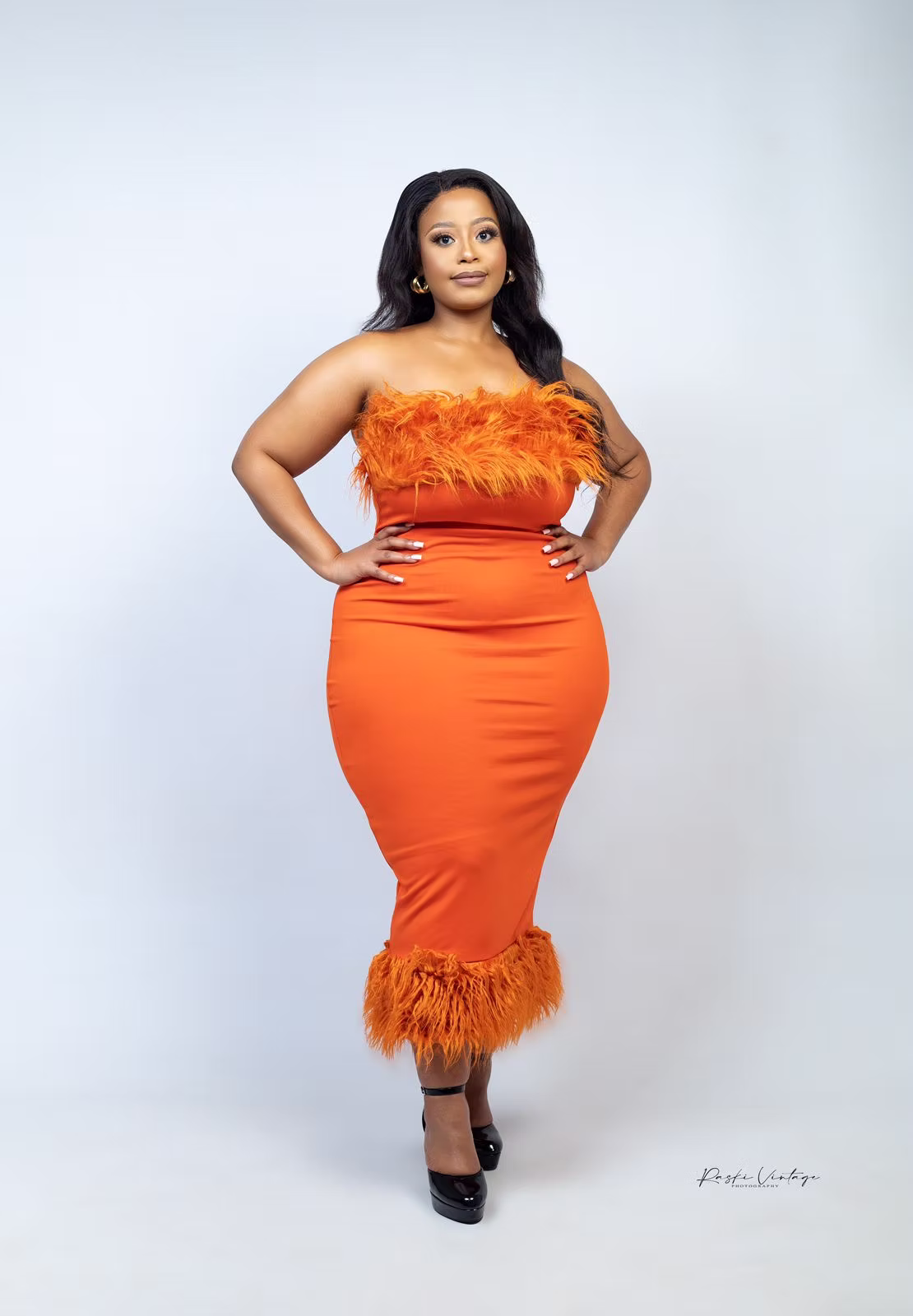 Kgopotjo Lebepe in an orange editorial look