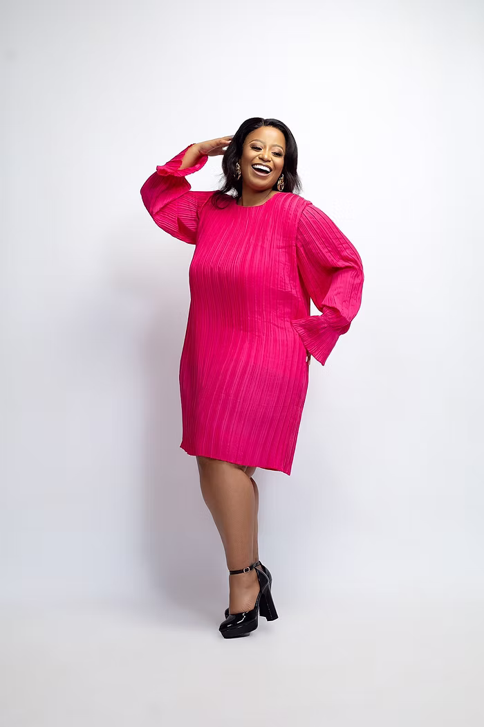 Kgopotjo Lebepe in a pink editorial portrait